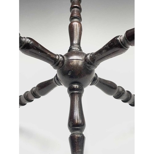 12 - A turned mahogany cat, 19th century, with central sphere and ridged spindles, height 28cm. Provenanc... 