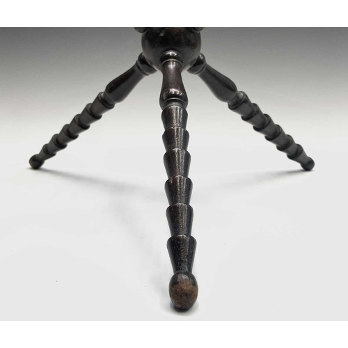 12 - A turned mahogany cat, 19th century, with central sphere and ridged spindles, height 28cm. Provenanc... 