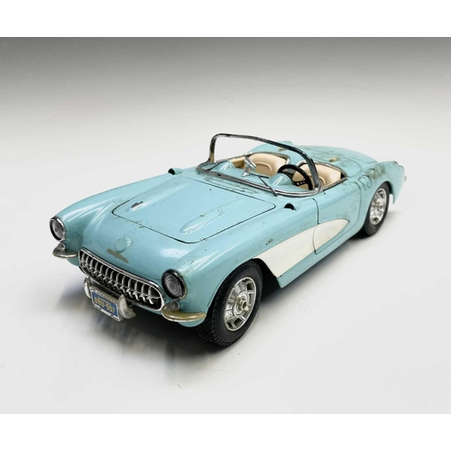 125 - A Burago diecast 1957 Chevrolet, together with an Ertl Chevrolet Corvette (2).