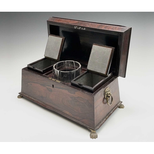 13 - A Regency rosewood tea caddy, of sarcophagus shape, with a glass mixing bowl and two lidded containe... 