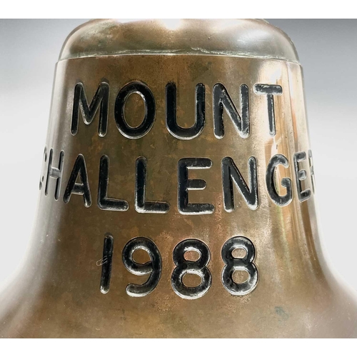 130 - A brass Ship's bell, from the trawler Mount Challenger, later engraved and dated 1988, stamped to th... 