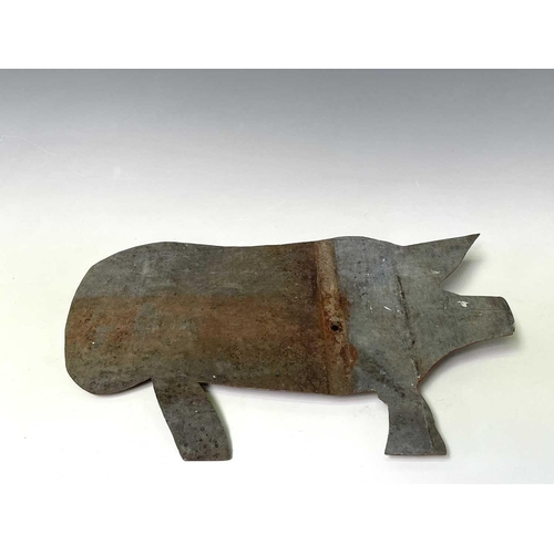 133 - A sheet metal weather vane mount in the form of a pig. Height 33cm, length 52cm.