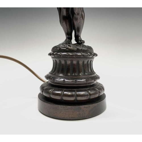 134 - A Victorian cast bronze figural table lamp. Height 41cm.