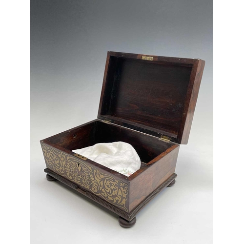 14 - A Regency rosewood and cut brass inlaid box or casket, raised on bun feet, width 30cm. Provenance: M... 