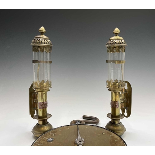 142 - A pair of brass candleholders, with applied GWR labels and glass shades, height 35cm, together with ... 