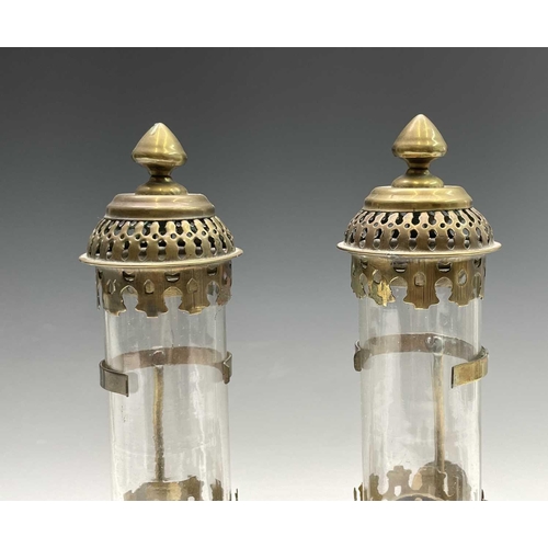 142 - A pair of brass candleholders, with applied GWR labels and glass shades, height 35cm, together with ... 