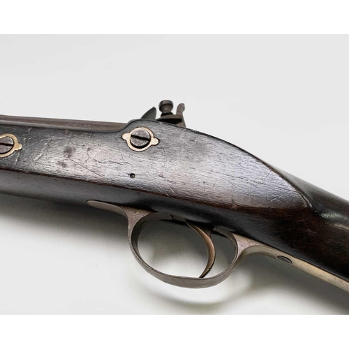 152 - A reproduction flintlock blunderbuss, with brass trigger guard, length 75cm.