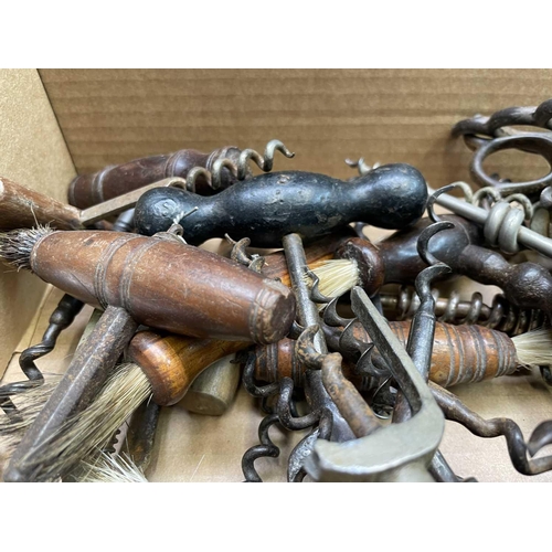 163 - A large collection of corkscrews, many 19th century, including some with brushes, folding bow type a... 