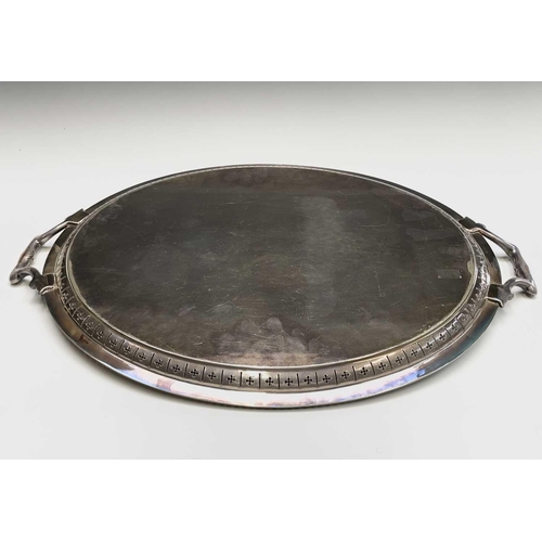 173 - A late Victorian silver plated oval tray, engraved with foliate roundels and festoons, with pierced ... 