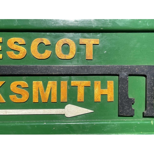 175 - A Locksmith's sign, mid 20th century, for E.Lescot, mounted with an oversize steel key, height 45cm,... 