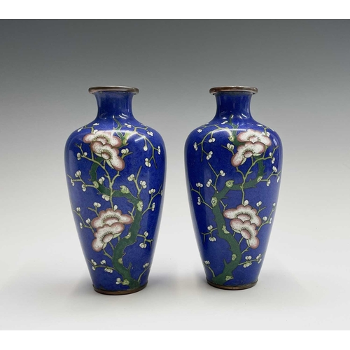 178 - A pair of Japanese cloisonne enamel vases, 20th century, decorated with flowering prunus on a blue g... 