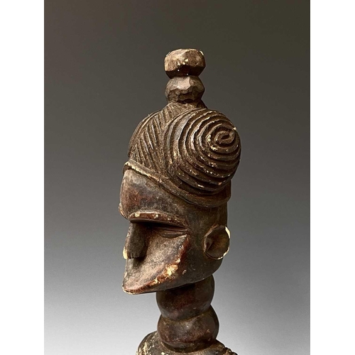 181 - A carved wood South Sea island figure. Height 59.5cm.