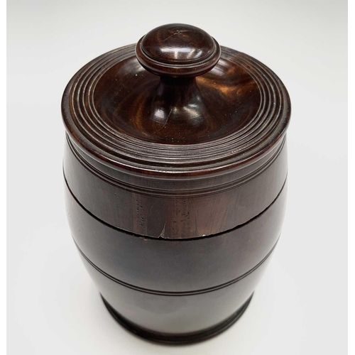 182 - A 19th century turned lignum vitae tobacco jar. Height 15cm.