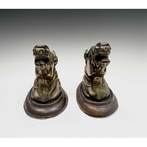 188 - A pair of brass horses' masks raised on copper wall mounts. Height 19cm, width 11.5cm, depth 18.5cm.