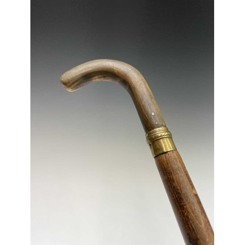 190 - A middle Eastern swordstick, with horn handle, length 96cm, together with an African leather covered... 