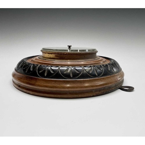 206 - An aneroid barometer, contained in a Cornish serpentine circular case, diameter 17cm, together with ... 