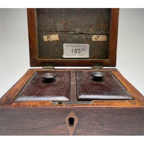 21 - A George III mahogany tea caddy, with oval inlaid patera panels, the cover opening to reveal two lid... 