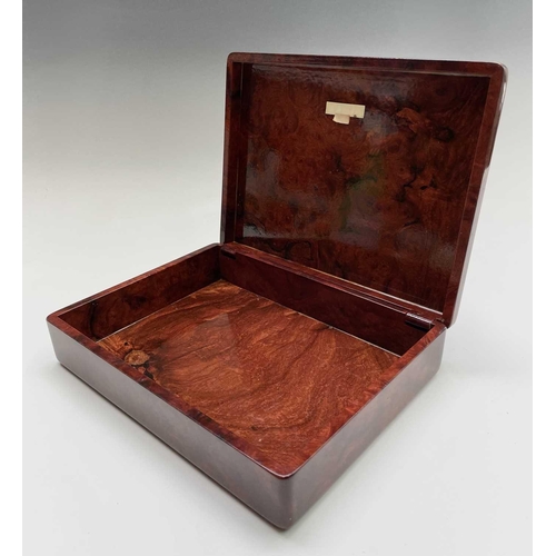 210 - A burr wood humidor. Height 7cm, width 30cm, depth 22cm.