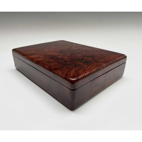 210 - A burr wood humidor. Height 7cm, width 30cm, depth 22cm.