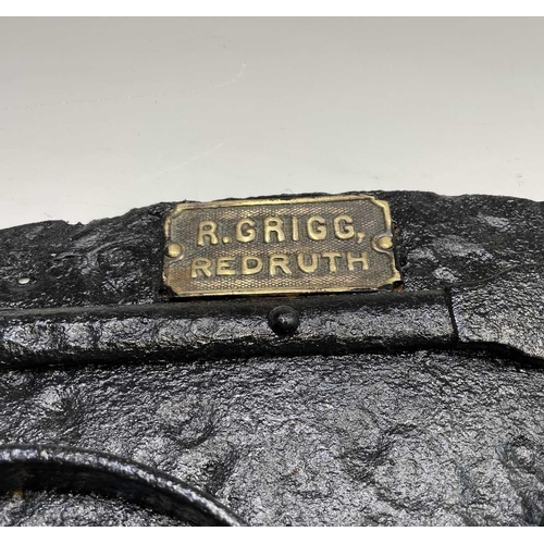 22 - A heavy cast iron Cornish range door, late 19th century, the brass plaque bearing inscription 'R. GR... 