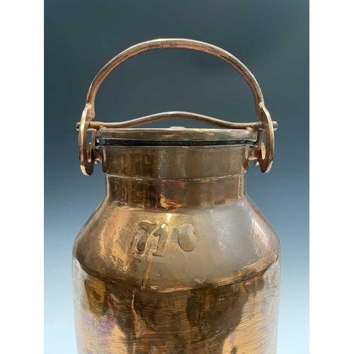 223 - A copper plated milk churn, the swing handle forming a locking device, height 63cm.