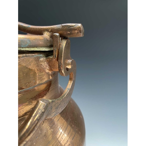 223 - A copper plated milk churn, the swing handle forming a locking device, height 63cm.