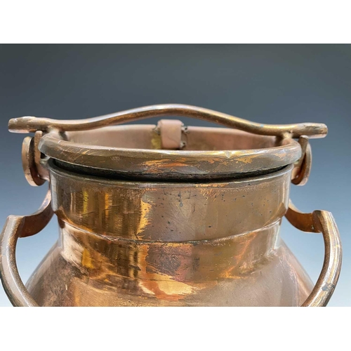 223 - A copper plated milk churn, the swing handle forming a locking device, height 63cm.