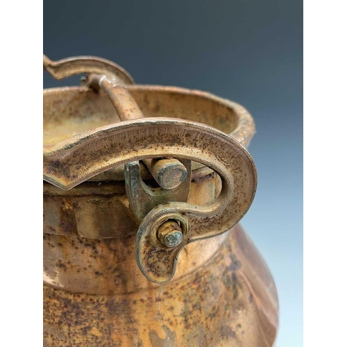 224 - A copper plated milk churn, the swing handle forming a locking device, height 63cm.