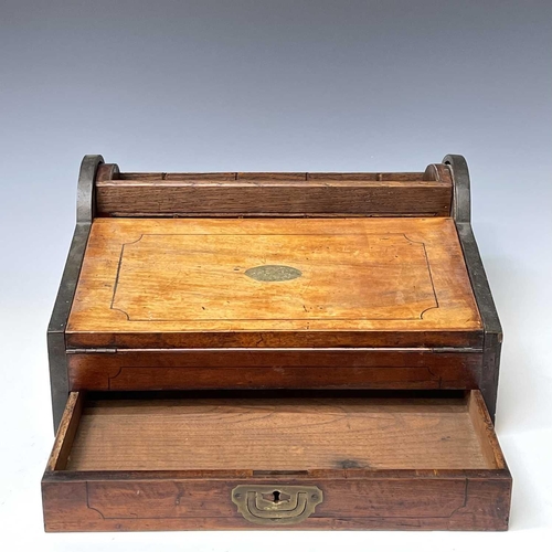 229 - A camphor wood campaign stationary box/writing slope, 19th century, the drawer and tambour top open ... 