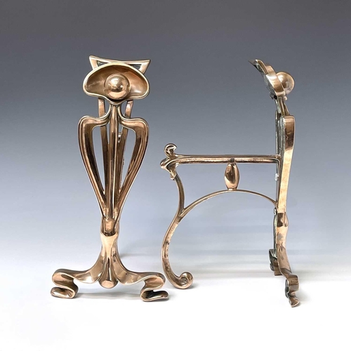 231 - A pair of Arts and Crafts copper firedogs, with stylised tulip uprights and whiplash tendrils, heigh... 