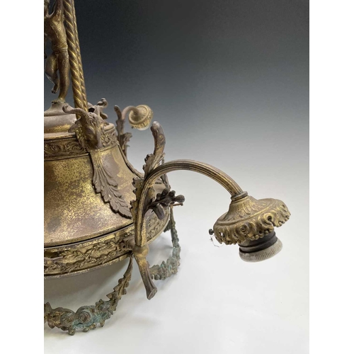 234 - A continental brass-finished tall electrolier, the central lamp with three branches surmounted by a ... 