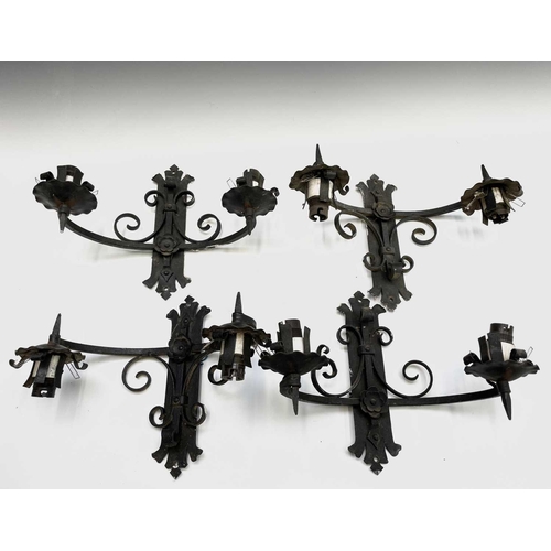 235 - A Gothic style wrought iron hanging electrolier, diameter 53cm, together with four similar twin bran... 