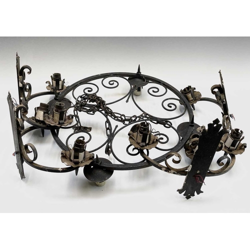 235 - A Gothic style wrought iron hanging electrolier, diameter 53cm, together with four similar twin bran... 