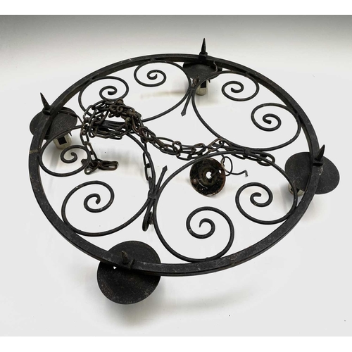 235 - A Gothic style wrought iron hanging electrolier, diameter 53cm, together with four similar twin bran... 