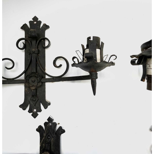 235 - A Gothic style wrought iron hanging electrolier, diameter 53cm, together with four similar twin bran... 