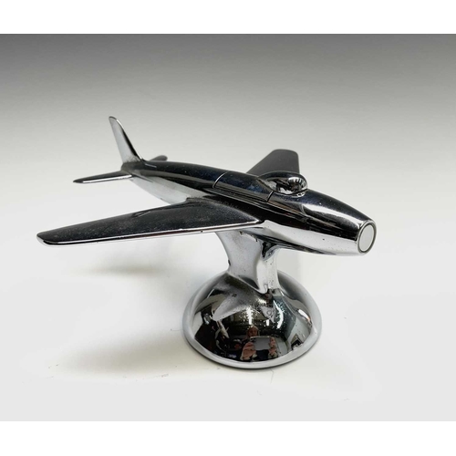 24 - A Dunhill 'Sabre' jet fighter table lighter, 1950s, with chrome finish, on a domed base, length 16.5... 