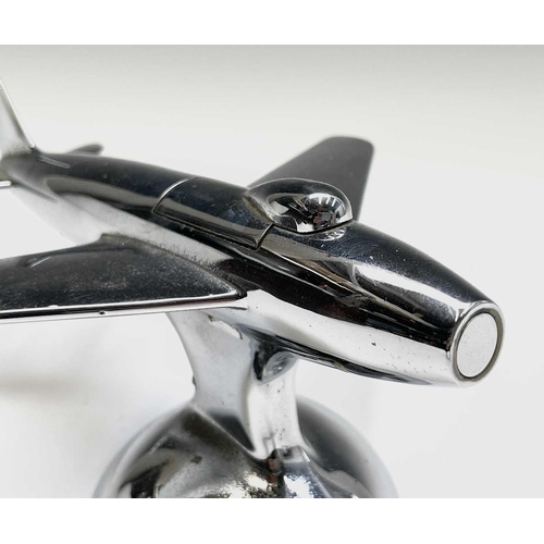 24 - A Dunhill 'Sabre' jet fighter table lighter, 1950s, with chrome finish, on a domed base, length 16.5... 