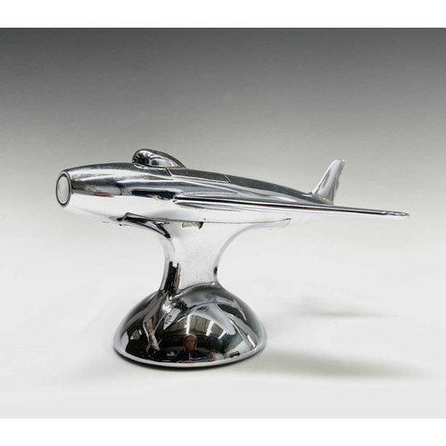 24 - A Dunhill 'Sabre' jet fighter table lighter, 1950s, with chrome finish, on a domed base, length 16.5... 