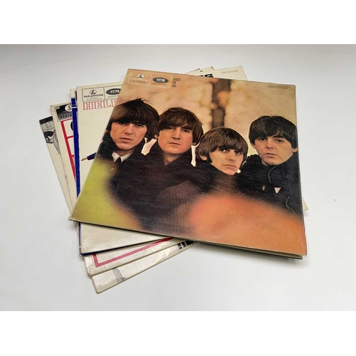 251 - Vinyl - A collection of The Beatles records comprising 'Sgt. Peppers Lonely Hearts Club Band', 'Off ... 