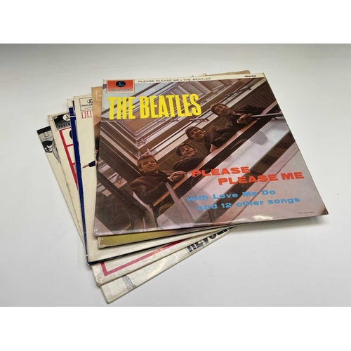 251 - Vinyl - A collection of The Beatles records comprising 'Sgt. Peppers Lonely Hearts Club Band', 'Off ... 