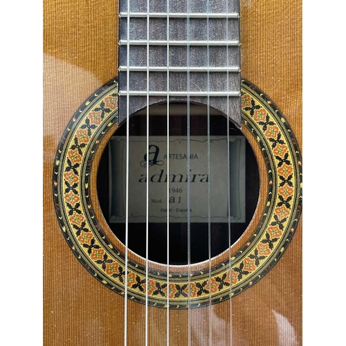 257 - An Admira Spanish-type classical guitar with stand and soft case.