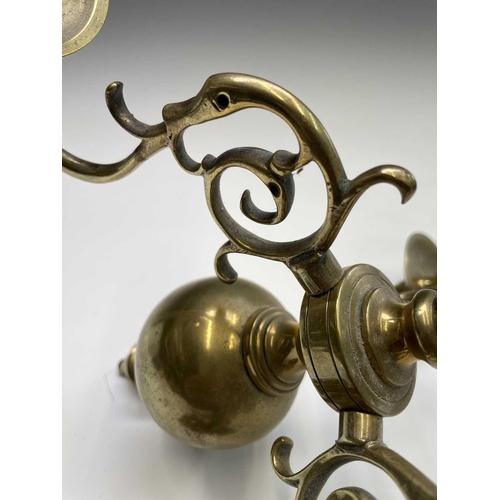 258 - A brass three branch chandelier, 20th century in the Dutch 18th century style, with numbered scroll ... 