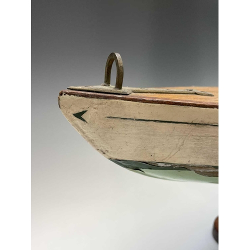 260 - A painted wooden pond yacht, with simulated planked deck, white and green hull and leaded keel, widt... 