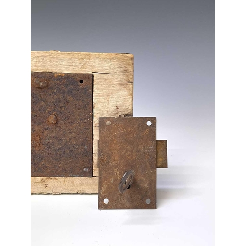 266 - A large barn door lock, 15 x 25.5cm, and a metal door lock with key (2).