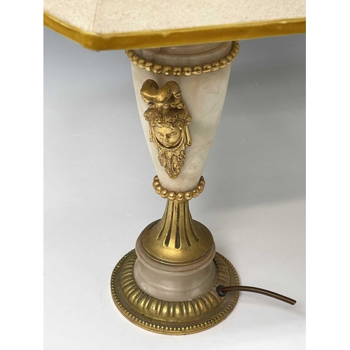 27 - An ornate alabaster table lamp, early 20th century, with gilt metal mask handles and mounts, height ... 