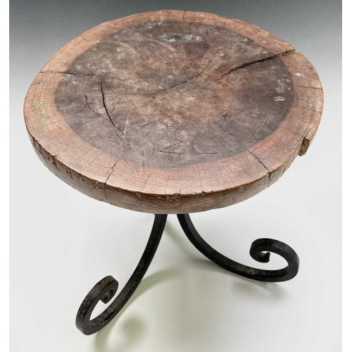 271 - A primitive green painted stool, together with a hardwood and wrought iron stand (2).