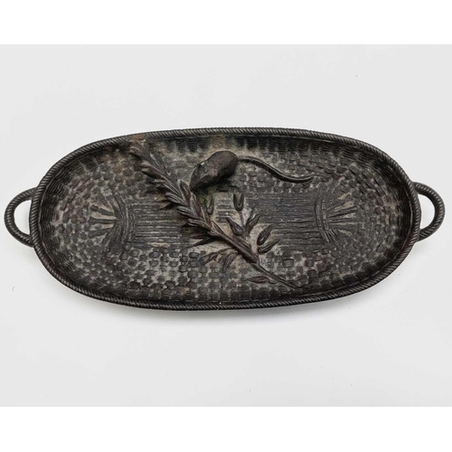 276 - A 20th century cast bronze sculpture of a mouse eating a sheaf of corn in a basket. Width 17.5cm.