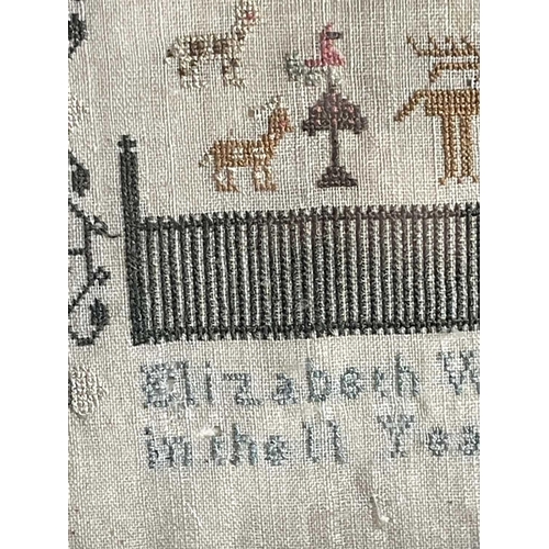 2802 - A George IV period sampler, worked by Elizabeth Wheatley aged eleven years, dated 1810, embroidered ... 