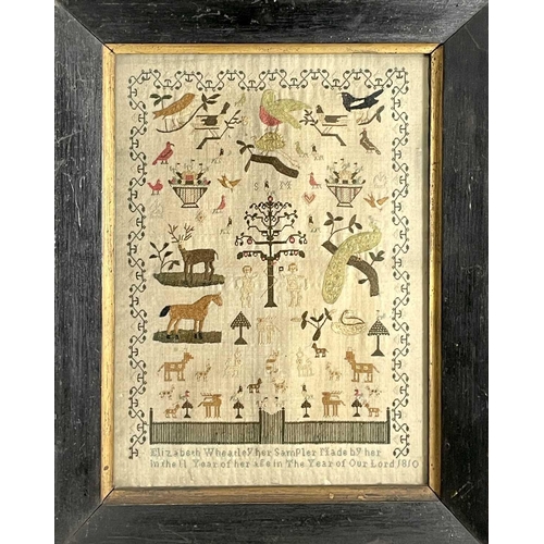 2802 - A George IV period sampler, worked by Elizabeth Wheatley aged eleven years, dated 1810, embroidered ... 