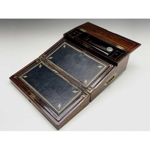 281 - A good quality early Victorian rosewood fold top writing box, with cut brass inlaid decoration, the ... 